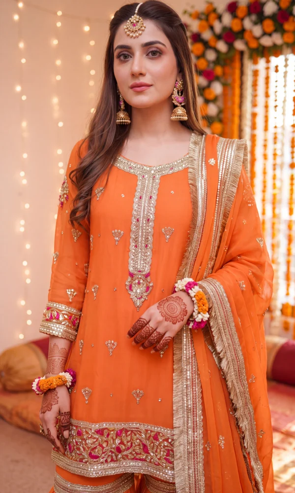 Vibrant Orange Embellished Short Kurti with Sharara and Detailed Dupatta